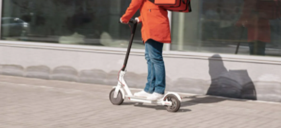 Active Travel Woman on Scooter