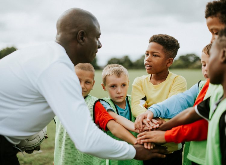 football coach with kids football coach with kids