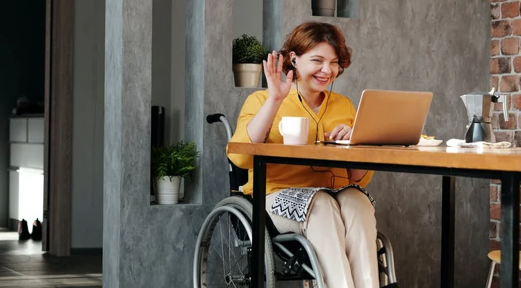 Lady in wheelchair smiling