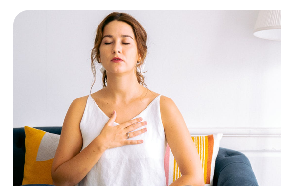 Lady with her hand over her heart