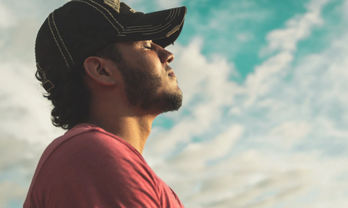 Man doing mindful breathing exercises