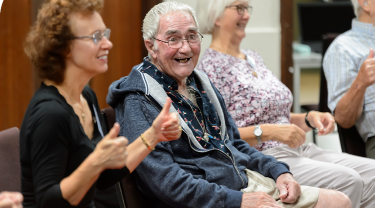 Older activity group having fun with alzheimer's friendly activities