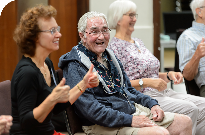 Older activity group having fun with alzheimer's friendly activities