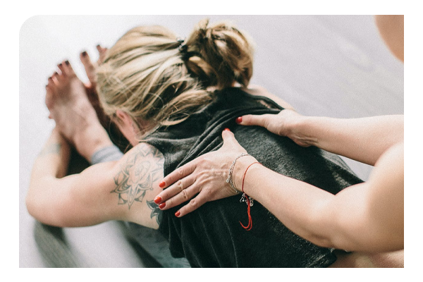 Lady stretching to reduce back pain