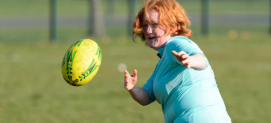 How active should I be: Woman throwing rugby ball