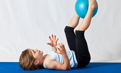 Young girl stretching