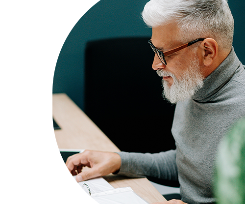 man looking at computer at work