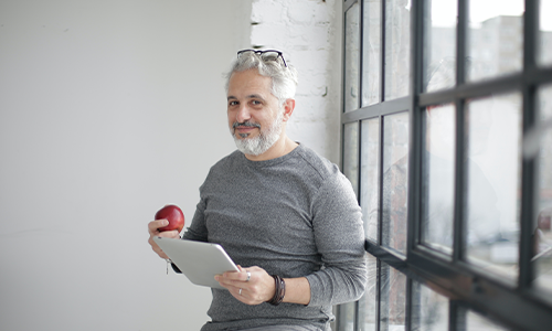 Older employee working at one of the active workplaces across the country