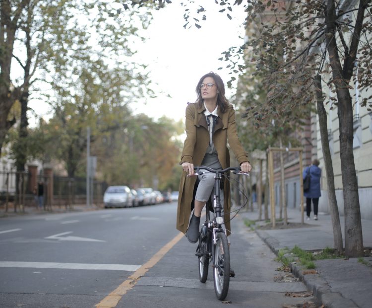 woman cyclist in healthy streets cycle lane