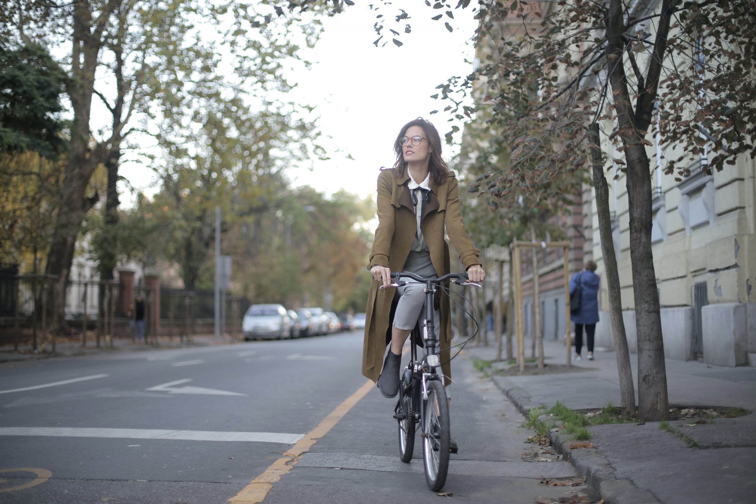 woman cyclist in healthy streets cycle lane