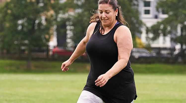 lady plays football