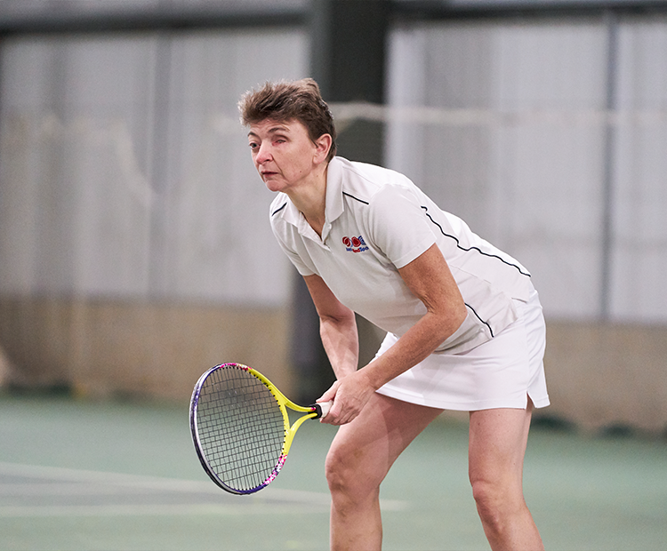 Woman with a disability playing tennis