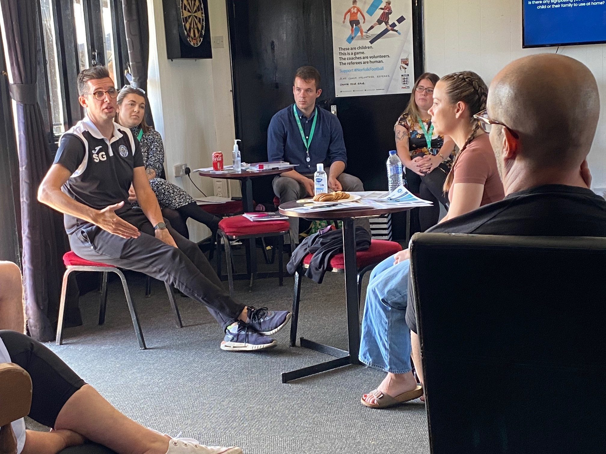 Staff discuss mental health at training