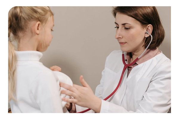 Little girl having a healthy lung check with a stethoscope