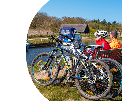 couple cycling in Norfolk