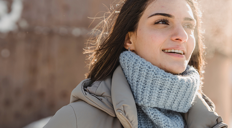 Woman taking a deep breath