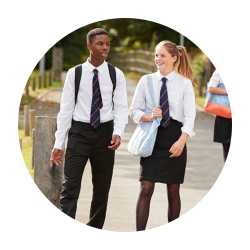 Two teenagers walking to school