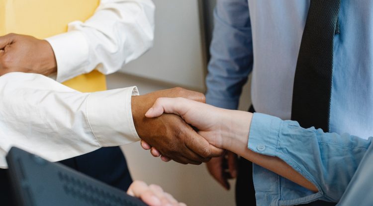 Two people shaking hands